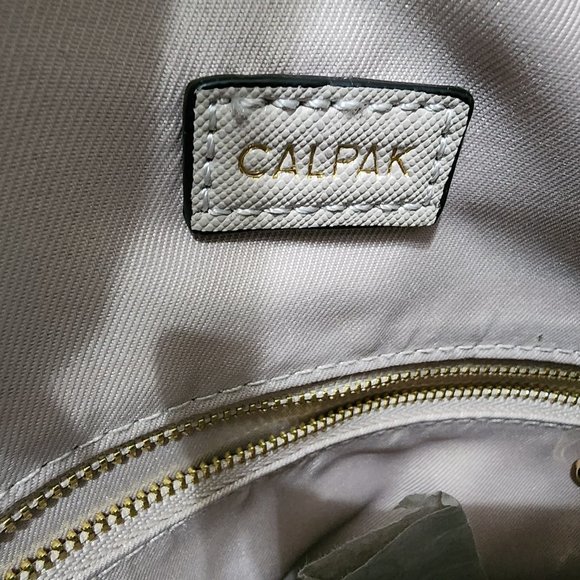 CALPAK Kaya Faux Leather Round Backback stone
